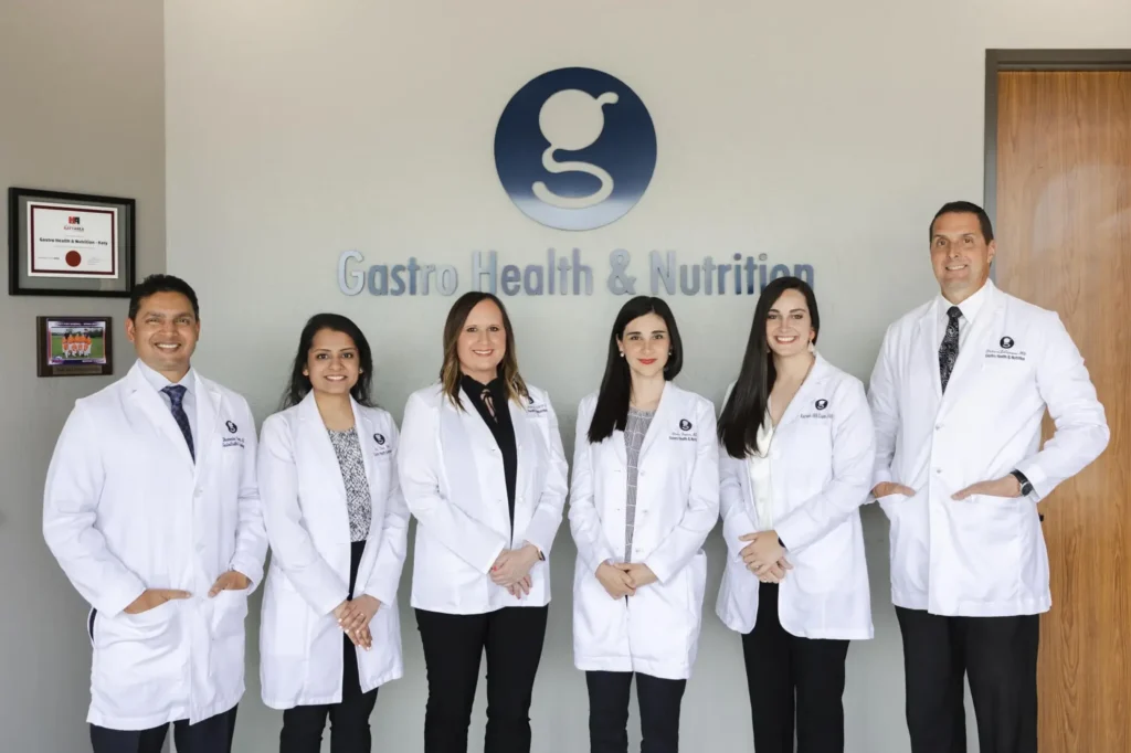 Doctors in white coats at Gastro Health locations